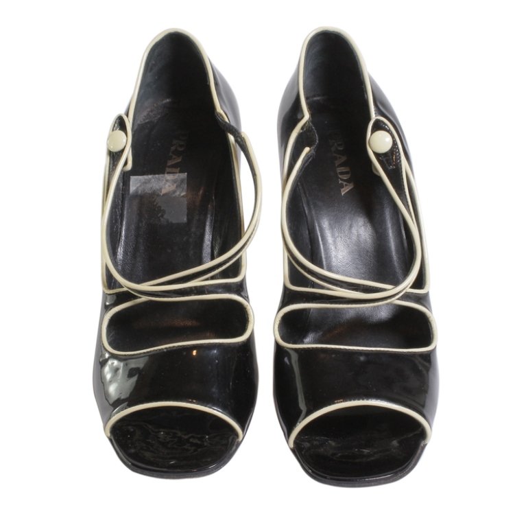 Black with White Accent Prada Shoes: Est. $75 - 150 Black with White Accent Prada Shoes. Marked Prada Made in Italy. 38. Vero Cuoio. Shoes have wear and condition issues that are normal with use. Comes with Prada dust bag.