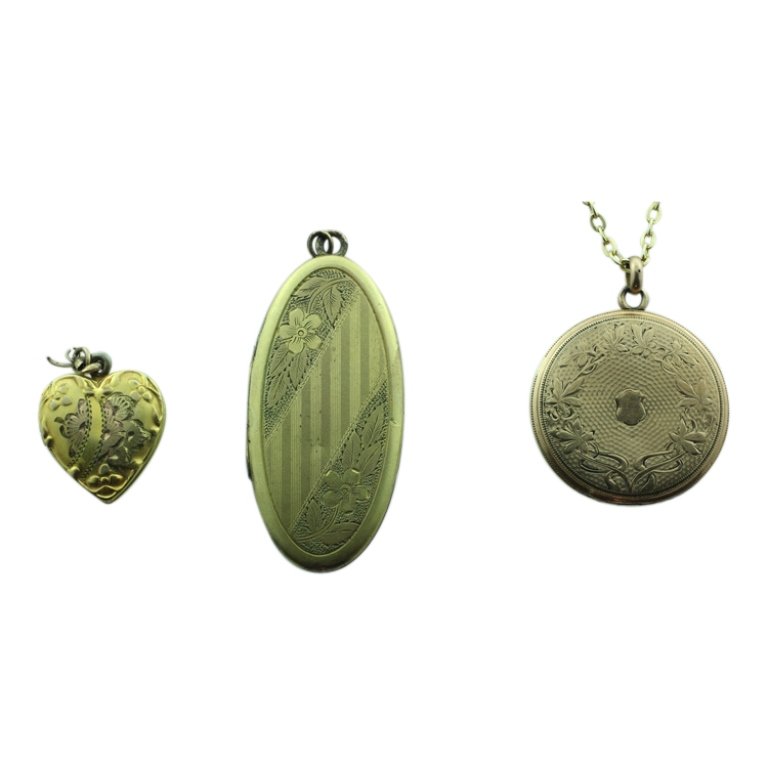 Group of 3 Vintage Lockets: Est. $30 - 60 Group of 3 Vintage Lockets. Heart locket marked 1/20 10KT and 3/4" tall. Oval locket is unmarked and 2" tall. Round 1.1/4" diameter locket on chain is marked Star W C Co., 1/10 Gold Shel