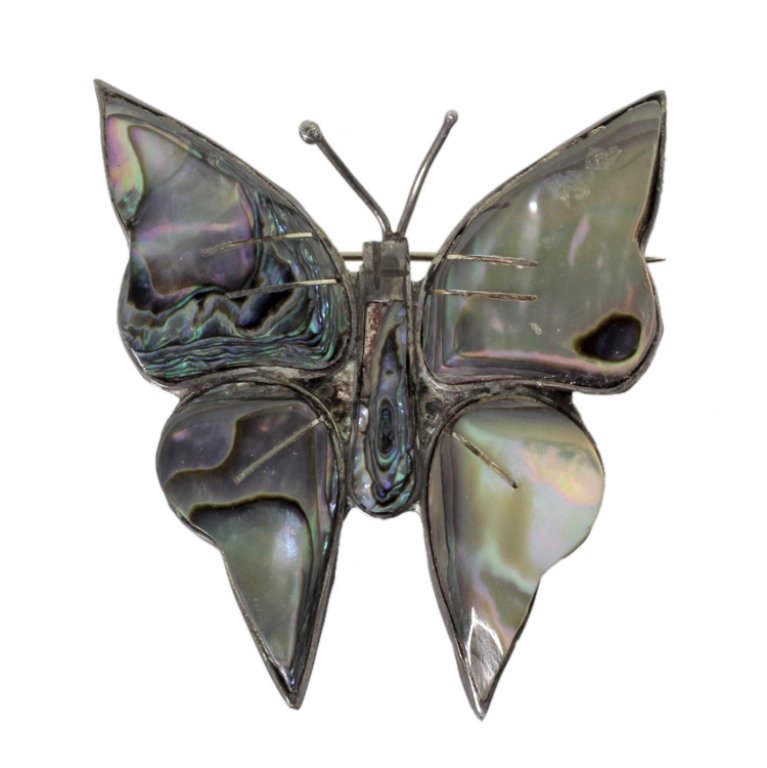 Mexican Silver Abalone Butterfly: Est. $ 40 - 60 Mexican Silver Abalone Butterfly. Unknown makers mark. Measures 2 inches tall.