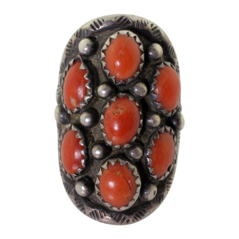 Sterling and Coral Ring: Est. $ 30 - 50 Sterling and Coral Ring. Weighs 12.4 grams. Size 6.25. Signed Sue.
