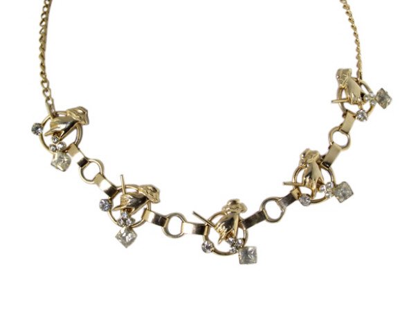 Vintage Gold Tone Necklace: Est. $ 30 - 45 Vintage Gold Tone Necklace. Gold tone necklace with hand holding a wand theme links. Rhinestone accents. 17 in long. See lot 93 for matching bracelet.