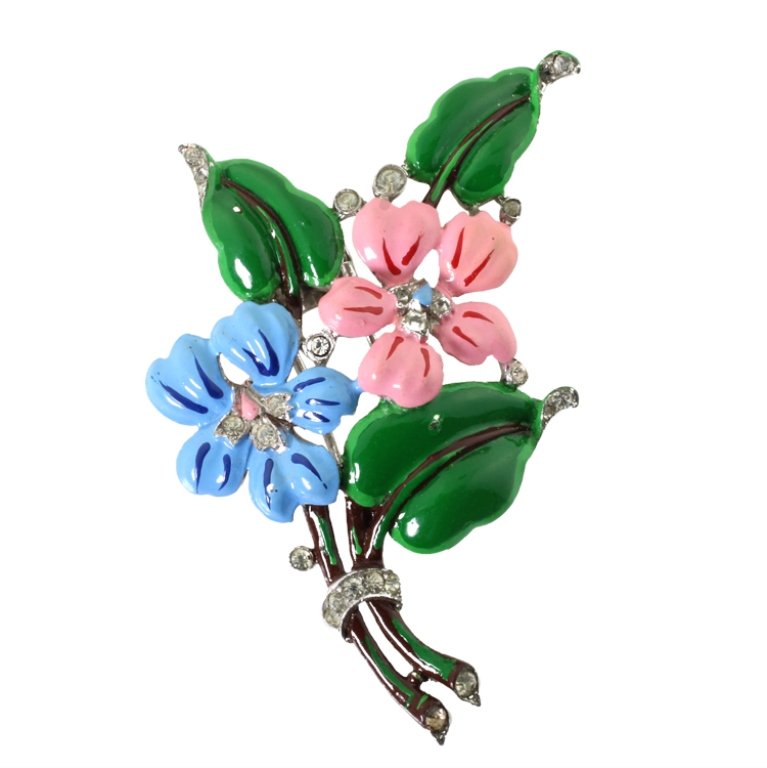 Vintage Trifari With Crown Fur Pin/Brooch: Est. $ 50 - 75 Vintage Trifari With Crown Fur Pin/Brooch. Floral theme fur pin/brooch with rhinestones and painted enamel highlights. Some loss to rhinestones. Mark: Trifari with crown on T, pat pend.