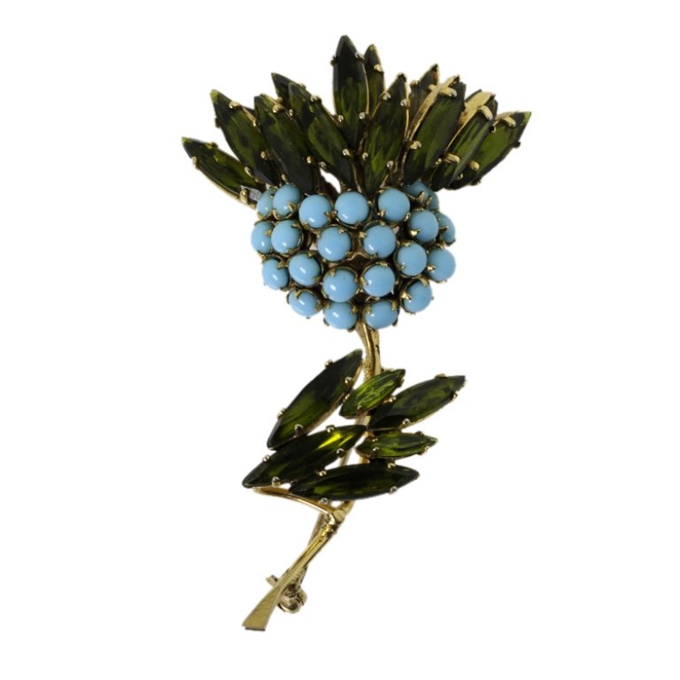 Vintage Schreiner New York Floral Brooch: Est. $ 150 - 225 Vintage Schreiner New York Floral Brooch. Green and blue gemstones. 1.75 x 2.75". Marked Schreiner New York.