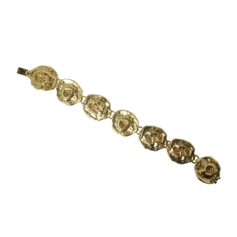 Yves Saint Laurent Bracelet: Est. $ 50 - 100 Yves Saint Laurent Bracelet. Measures 8 inches long. Marked YSL, Made in France.