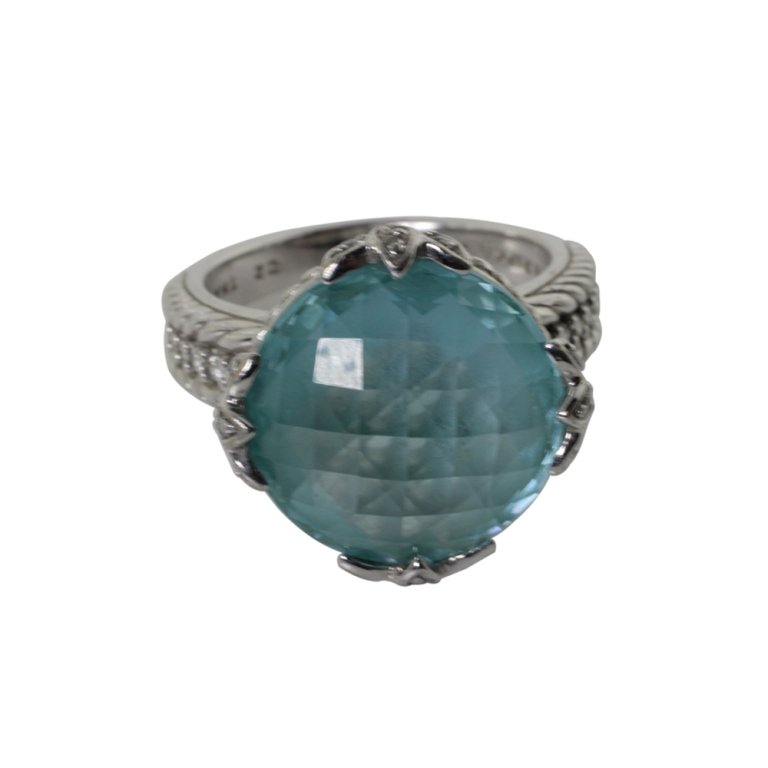 Judith Ripka Sterling Fashion Ring: Est. $ 20 - 40 Judith Ripka Sterling Fashion Ring. Weighs 12 grams. Marked Judith Ripka, 925, Thailand. Size 9.