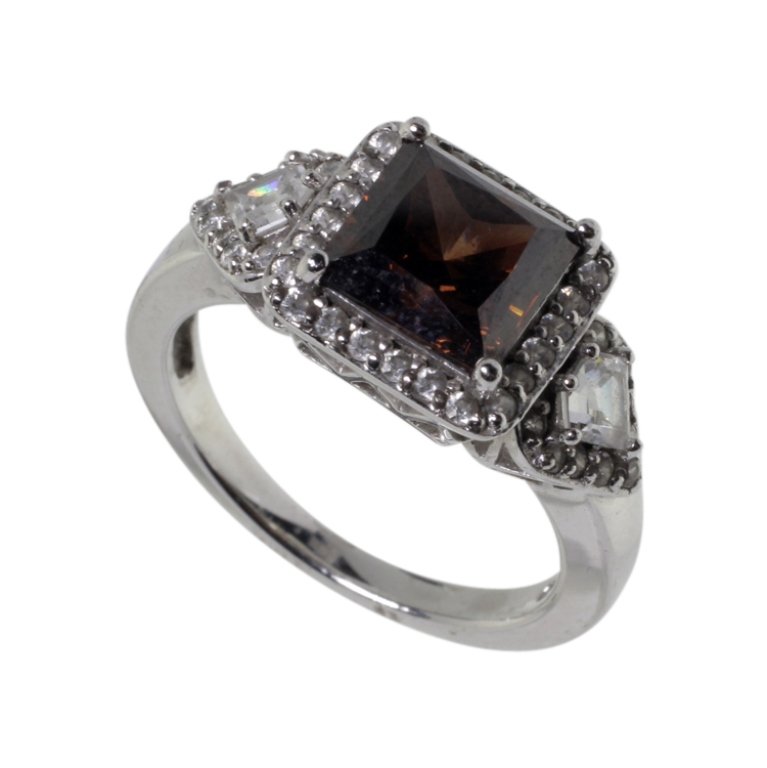 Sterling and Garnet Fashion Ring: Est. $ 20 - 40 Sterling and Garnet Fashion Ring. Weighs 4.7 grams. Marked 925, China. Size 7