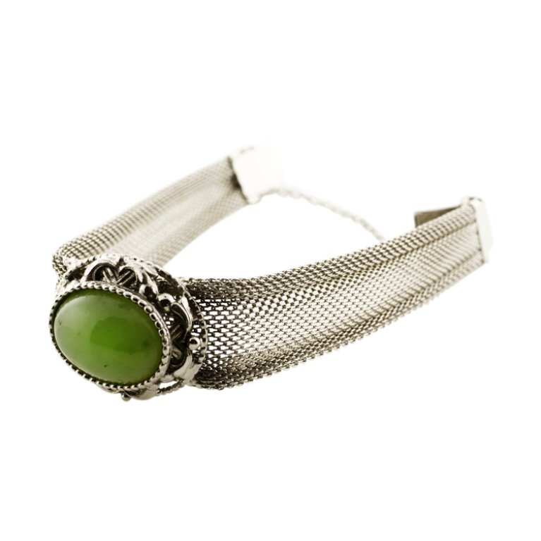 Mesh Costume Gemstone Bracelet: Est. $15 - 30 Mesh Costume Gemstone Bracelet. Measures 7 inches long. Has safety chain.