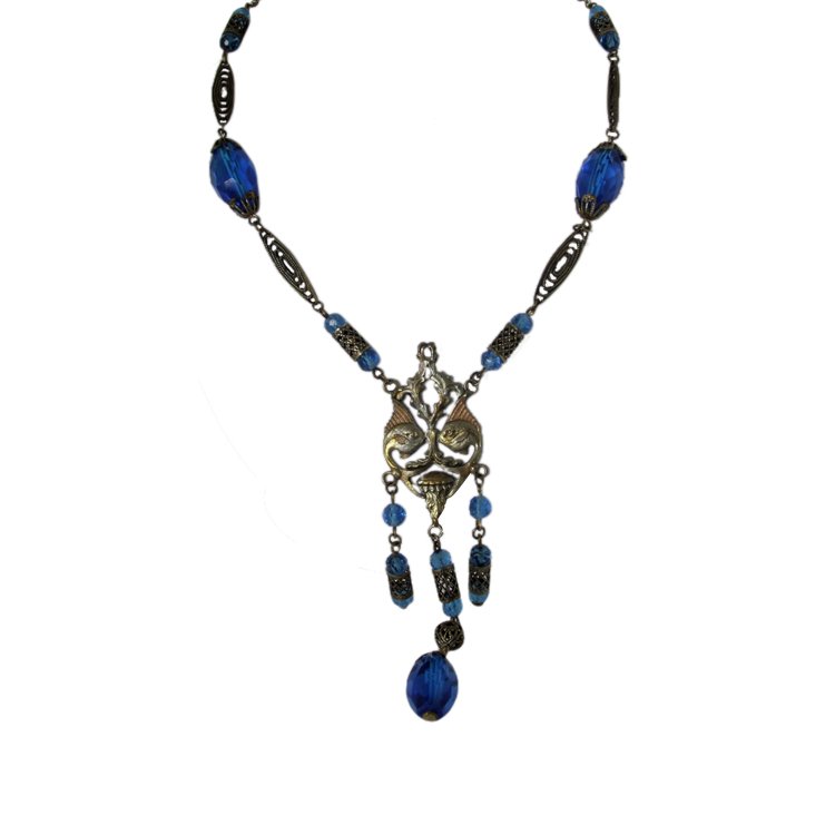 Vintage Beaded Necklace: Est. $ 100 - 250 Vintage Beaded Necklace. Antique gold tone necklace with blue faceted beads. Design includes kissing fish and jellyfish. Chain is 30 inches long.