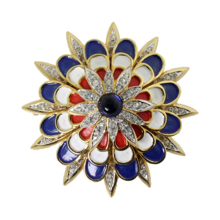 Jomaz Rhinestone Enamel Brooch: Est. $ 50 - 100 Jomaz Rhinestone Enamel Brooch. Vintage brooch with red, white & blue enamel and rhinestones. Marked Jomaz. 2 inch diameter.