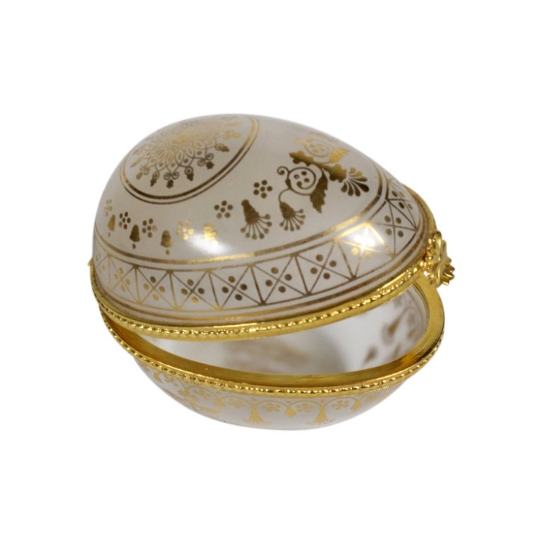 Este Lauder Egg Trinket Box: Est. $ 20 - 30 Este Lauder Egg Trinket Box. Measures 2 inches tall. Marked Made in Japan Especially for Este Lauder.