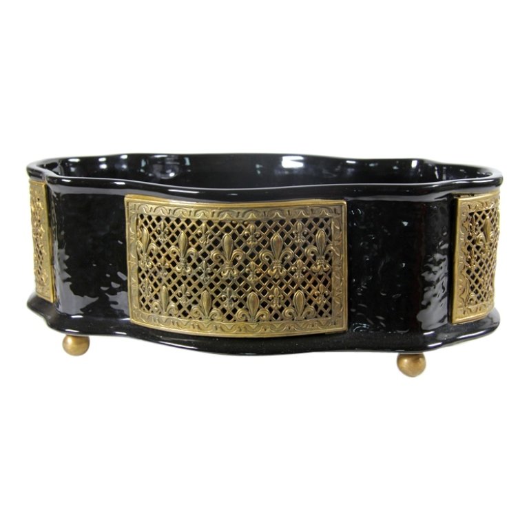 Modern Black Glazed Centerpiece: Est. $ 100 - 150 Modern Black Glazed Centerpiece. Pottery centerpiece with ormolu panels. Circa 21st century. 6.5 x 17.5 x 5".