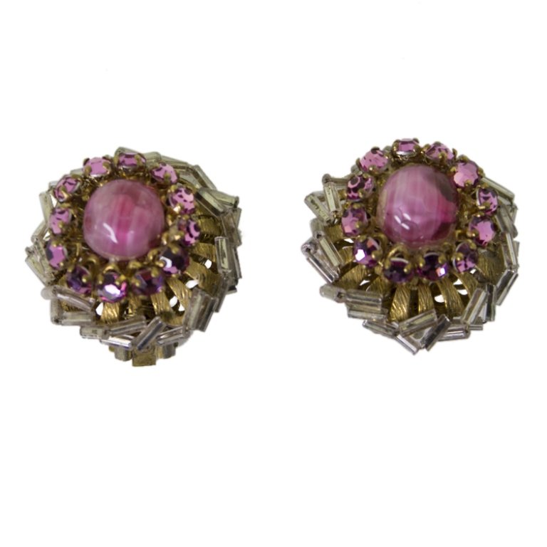 Miriam Haskell Pink Rhinestone Vintage Earrings: Est. $ 75 - 125 Miriam Haskell Pink Rhinestone Vintage Earrings. Vintage earrings with central pink glass bead surrounded by pink rose montee rhinestones and clear glass bugle beads wired to an antiqu