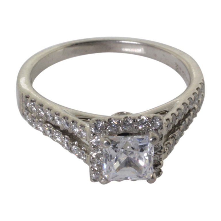 Palladium and Diamond Engagement Ring: Est. $ 100 - 200 Palladium and Diamond Engagement Ring. Weighs 3.6 grams. Marked PD 950. Diamond accent stones. CZ main stone. Setting for approx .75 ct princess. Size 6.