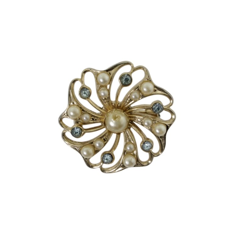 Coro Brooch: Est. $ 40 - 60 Coro Brooch. Gold tone with faux pearl and blue rhinestones. Marked Coro. 1 inch diameter.