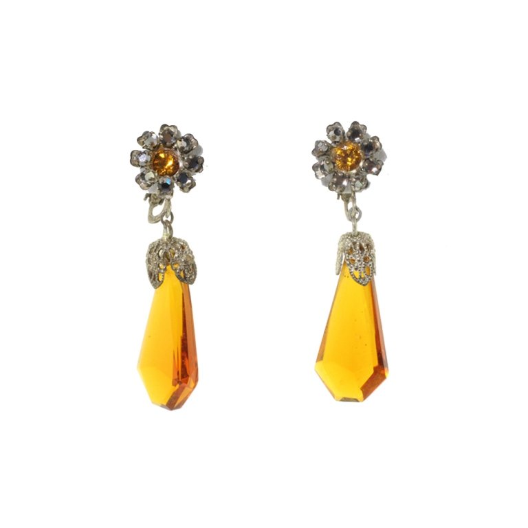 Miriam Haskell Dangle Earrings: Est. $ 75 - 150 Miriam Haskell Dangle Earrings. Clip on style. Measures 2 inches long. Marked Miriam Haskell.