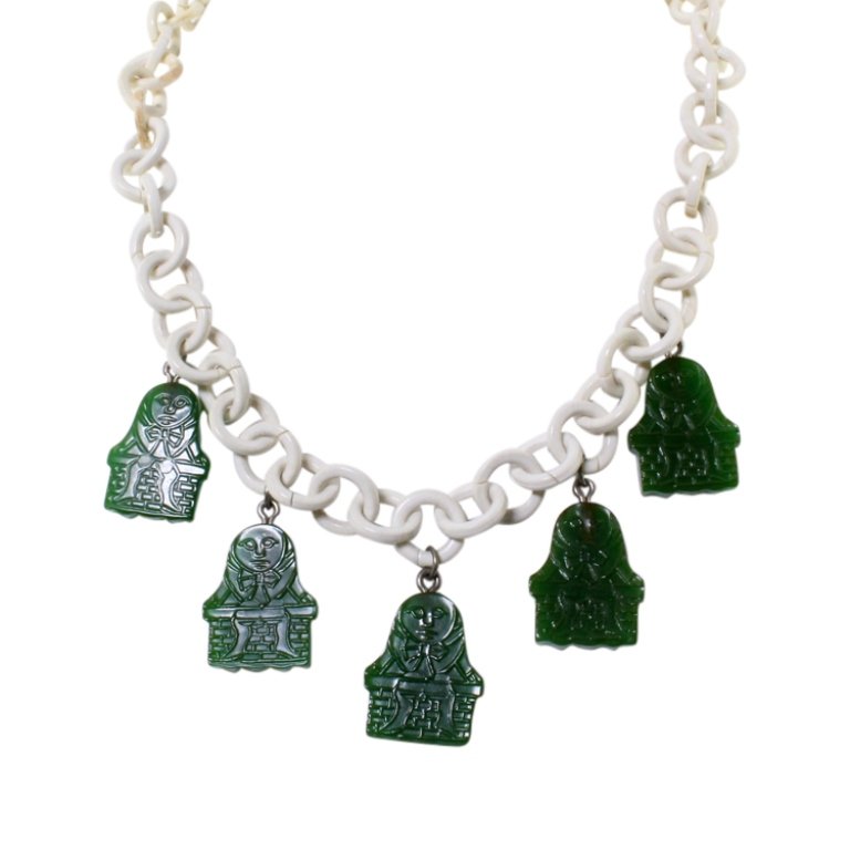 Vintage Humpty Dumpty Celluloid Necklace: Est. $ 25 - 50 Vintage Humpty Dumpty Celluloid Necklace . White chain necklace with green molded Humpty Dumpty Figure. 17 inches long.