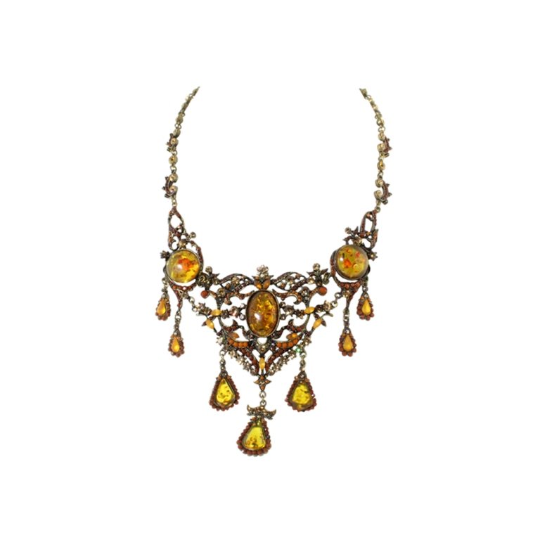 Vintage Style Faux Amber and Rhinestone Necklace: Est. $ 20 - 50 Vintage Style Faux Amber and Rhinestone Necklace. Antiqued gold necklace with faux amber and rhinestones. (2) small accent stones missing. Measures 17 inches long.