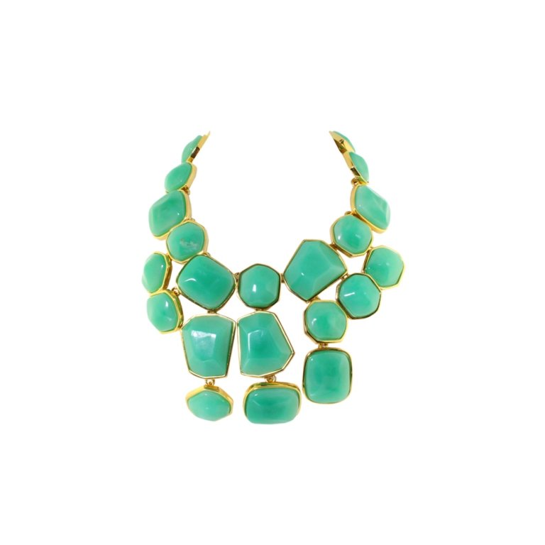 Kenneth J Lane Green & Gold Bib Necklace: Est. $ 25 - 50 Kenneth J Lane Green & Gold Bib Necklace. Bib style necklace with gold body and green inset molded stones. 18 inches max length.
