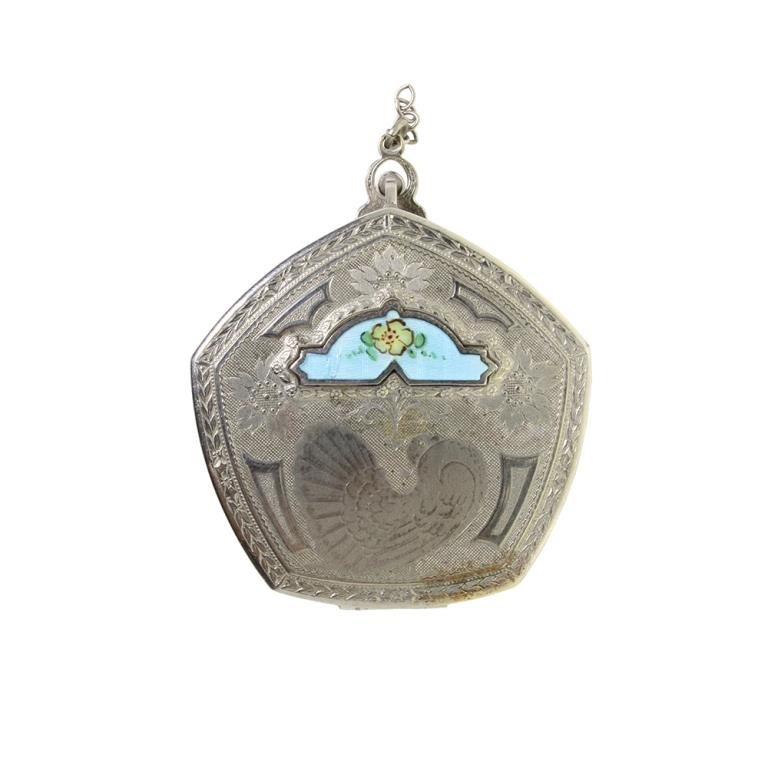 Vintage Silver Tone Guilloche Compact: Est. $ 50 - 75 Vintage Silver Tone Guilloche Compact. Unmarked compact with intricate design of flowers and bird on front along with guilloche flower. Still has both puffs inside. Hexagon shape 2.25 x
