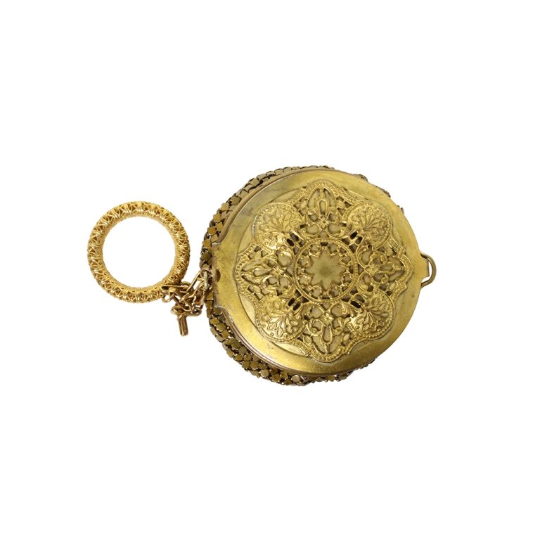 Vintage Gold Mesh Compact: Est. $ 50 - 75 Vintage Gold Mesh Compact . Unmarked gold mesh compact includes powder puff with mirror and intricate design on metal top. 3 inch diameter. Chain is 2 inches.
