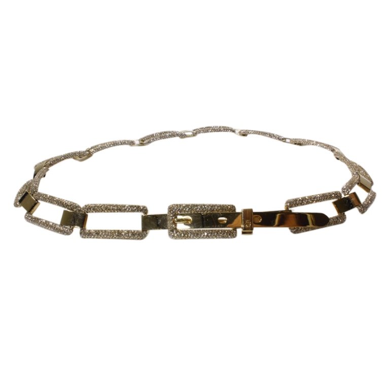 Ralph Lauren Rhinestone Belt: Est. $ 75 - 100 Ralph Lauren Rhinestone Belt. Marked Ralph Lauren, RL, 67. Rhinestone and gold tone belt is 37 inches. Comes with Ralph Lauren blue dust bag. Some scratches.
