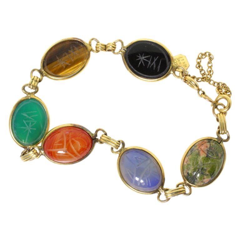 Karen Lynne Scarab Gemstone Bracelet: Est. $ 20 - 30 Karen Lynne Scarab Gemstone Bracelet. Measures 8 inches long. Carved scarab gemstones. Safety chain.