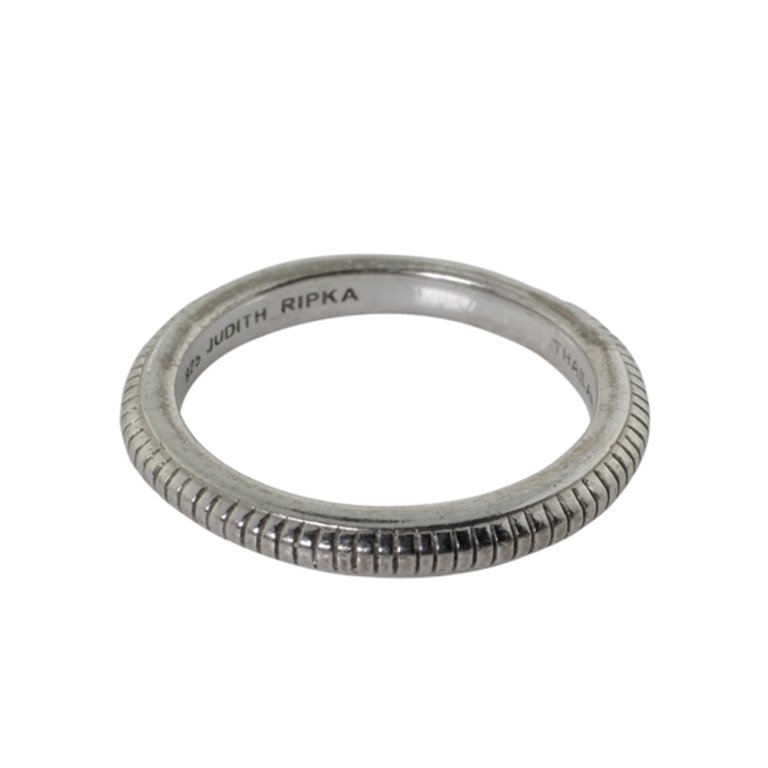 Judith Ripka Sterling Band: Est. $ 20 - 30 Judith Ripka Sterling Band. Weighs 3.7 grams. Marked 925, Judith Ripka, Thailand. Size 8