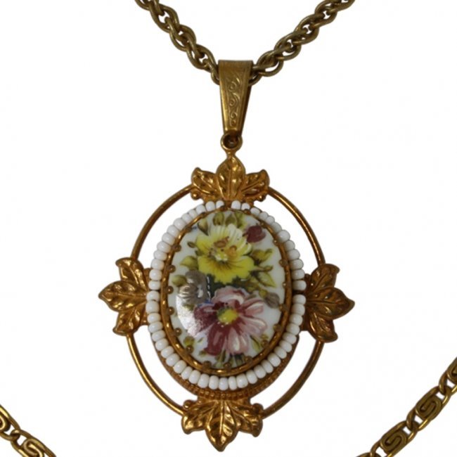 Miriam Haskell Necklace: $200-$400 Miriam Haskell Necklace. Marked Miriam Haskell on back on pendant. Pendant is 2.1/2 x 1 1/2 inches including bale. Double stand necklace is 28 inches long.