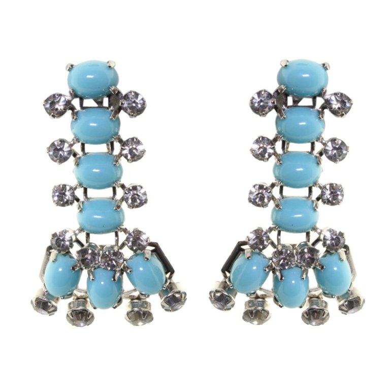 Kramer of New York Clip On Earrings: Est. $ 30 - 50 Kramer of New York Clip On Earrings. Measures 1.5 inches long. Marked Kramer of New York. Prong set rhinestones and cabochons.