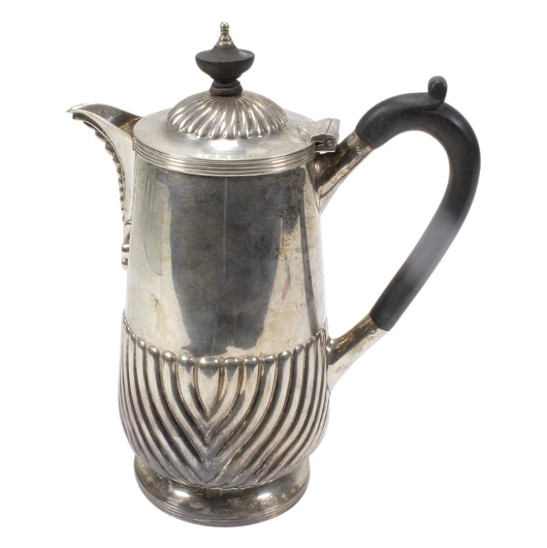 Elkington and Co Sterling and Ebony Coffee Pot: Est. $ 400 - 600 Elkington and Co Sterling and Ebony Coffee Pot. Measures 8.25 inches tall. Marked E&Co, Anchor, Lion, V. Ebony handle. Weighs 15.02 ozt.