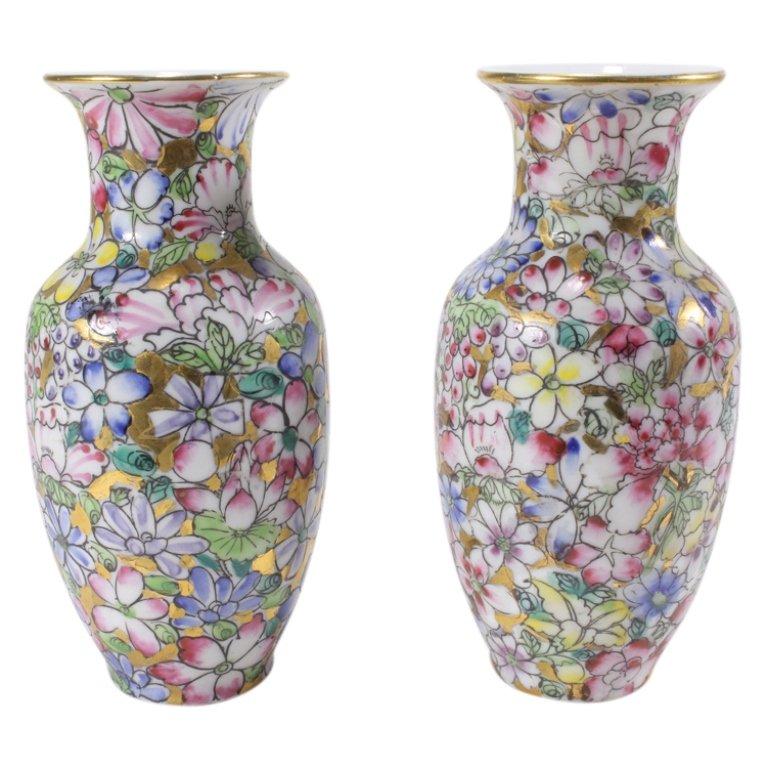 Painted Porcelain Vase Pair: Est. $ 25 - 40 Painted Porcelain Vase Pair. A pair of 6inch polychrome fire enameled porcelain vases, bottom marked Japanese porcelain ware decorated in Hong Kong ACE.