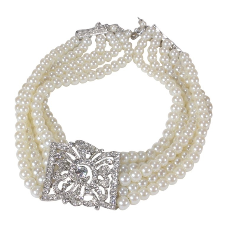 Kenneth J Lane 5 Strand Faux Pearl Necklace: Est. $ 50 - 100 Kenneth J. Lane Five Strand Faux Pearl Rhinestone Necklace. Measures approx. 15 inches. Choker style. Marked KJL.