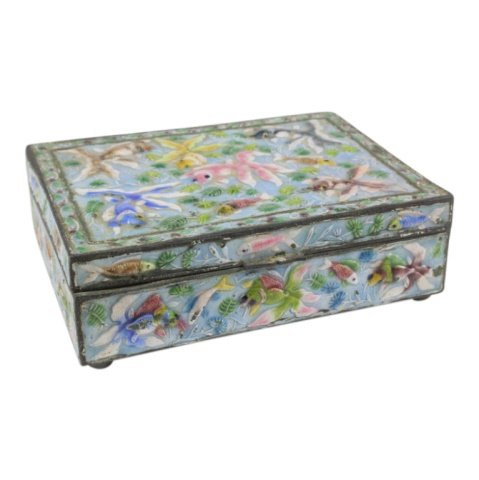 Metal Enamel Wooden Trinket Box: Est. $ 15 - 30 Metal Enamel Wooden Trinket Box. Measures approx. 5 inches x 3.5 inches. Fish theme. Metal and Enamel over wood. Marked China.