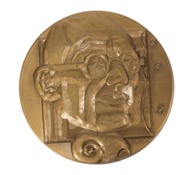Modernist Architect Le Corbusier 1976 Bronze Medal: Est. $ 25 - 75 Modernist Architect Le Corbusier 1976 Bronze Medallion. 80mm. Architect Charles-Édouard Jeanneret-Gris, " Le Corbusier", Modernist Architect. Signed J.C. Allement. Edge marked 1976 Bro