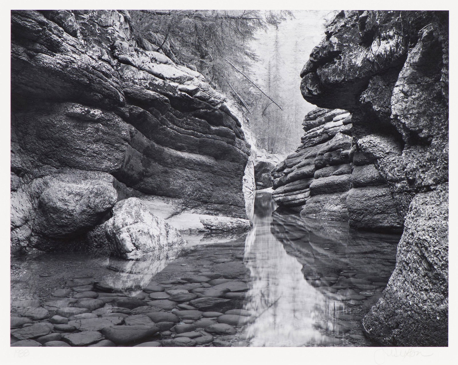 John Sexton Pool, Maligne Canyon, 1988, printed 1990: John Sexton (American, b. 1953) Pool, Maligne Canyon, 1988, printed 1990 Gelatin silver print mounted on archival board 9.5 x 12.5625 (in) 16 x 20 (in) mount size Signed in pencil John Sexton, lower r