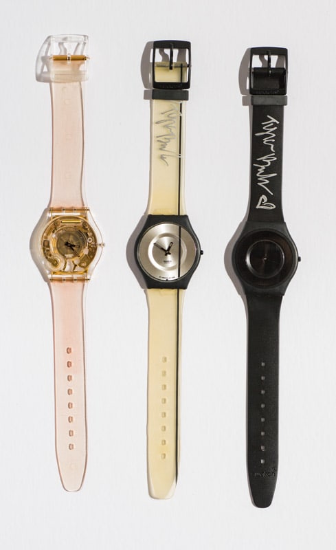(1) Jelly Skin, (1) Pure Line - signed, (1) Black Out Too - signed: Swatch Skin - Jelly Skin (SFK100). 1999. Plastic Case Material. Plastic Strap. Pin Buckle. Swatch Skin - Pure Line, signed by Tyra Banks (SFB101). 1996. Quartz. Plastic Case Material. Plastic Strap. P