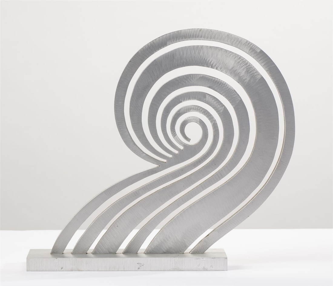 Jack Youngerman Upsure, 1989: Jack Youngerman (American, 1926-2020) Upsure, 1989 Brushed aluminum 18.5 x 20.5 x 4.25 (in) Incised and dated JY 1989, bottom Provenance: Collection of Dr. Leo H. Munick, Cincinnati, Ohio.