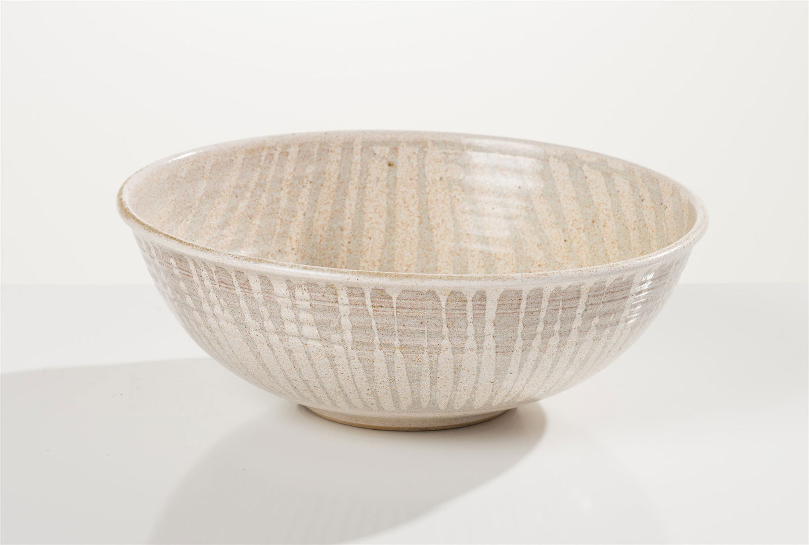 Peter Voulkos Bowl with Grid Pattern: Peter Voulkos (American, 1924-2002) Bowl with Grid Pattern Ceramic 4.75 x 13.25 x 13.25 (in) Incised Voulkos, bottom Provenance: Collection of Midge and Jerry Golner, Phoenix, Arizona.