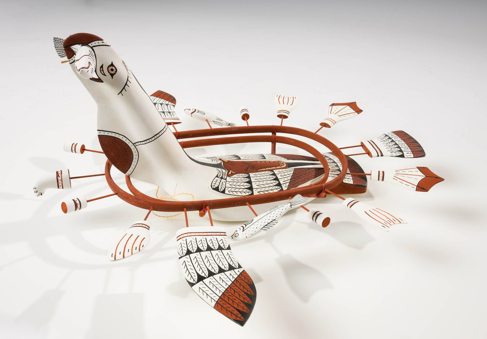 Peter L. Smith Untitled Loon Mask, 1991: Peter L. Smith (Native American, 20th Century) Untitled Loon Mask, 1991 Carved and painted wood and twine 12.75 x 32.5 x 29.5 (in) Signed in pen Peter L. Smith, bottom $500 - $1,000 Located Mekoryuk,