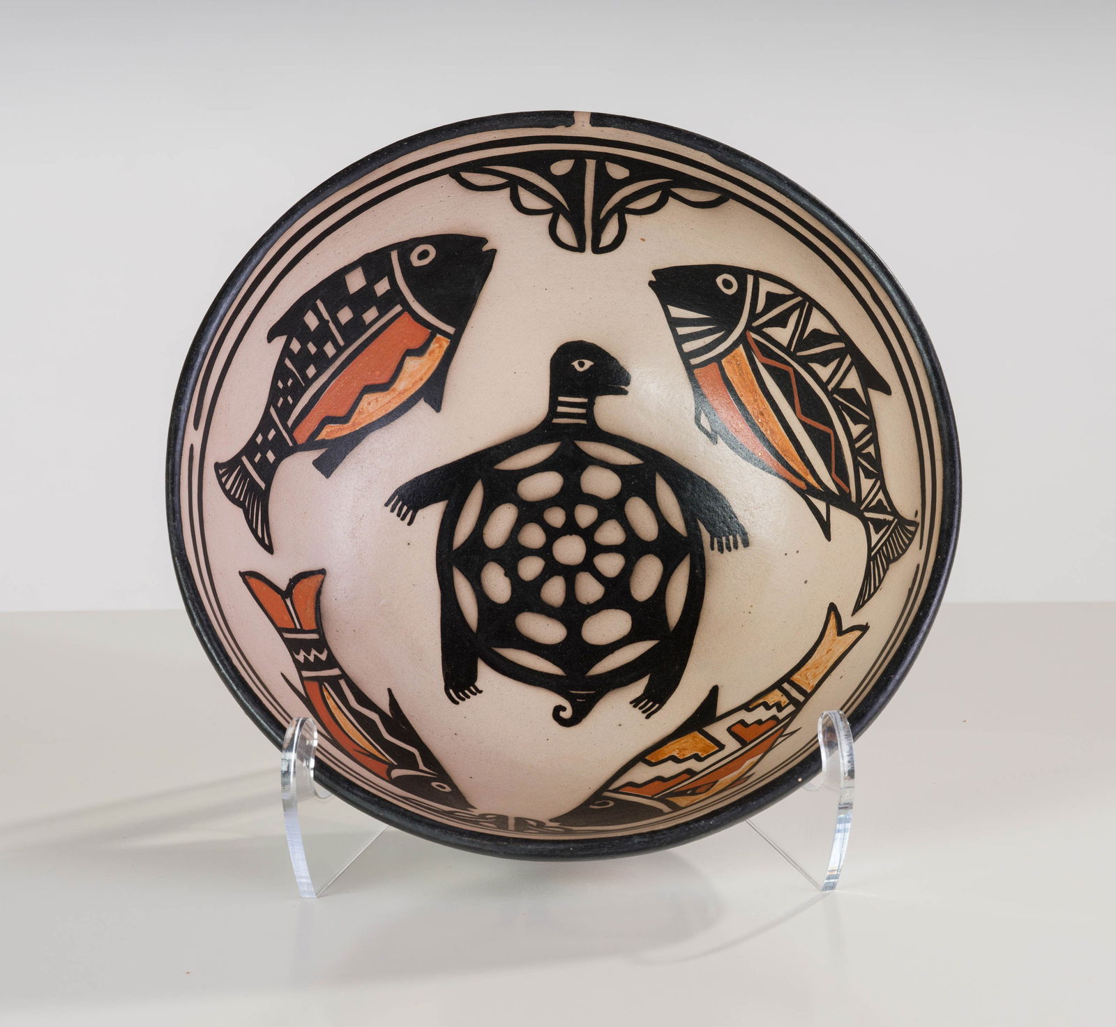Robert Tenorio Fish and Turtle Bowl, 2006: Robert Tenorio (Native American, b. 1950) Fish and Turtle Bowl, 2006 Polychrome redware 4 x 11 x 11.25 (in) Incised Robert Tenorio Kewa N.M. 006, bottom $500 - $1,000