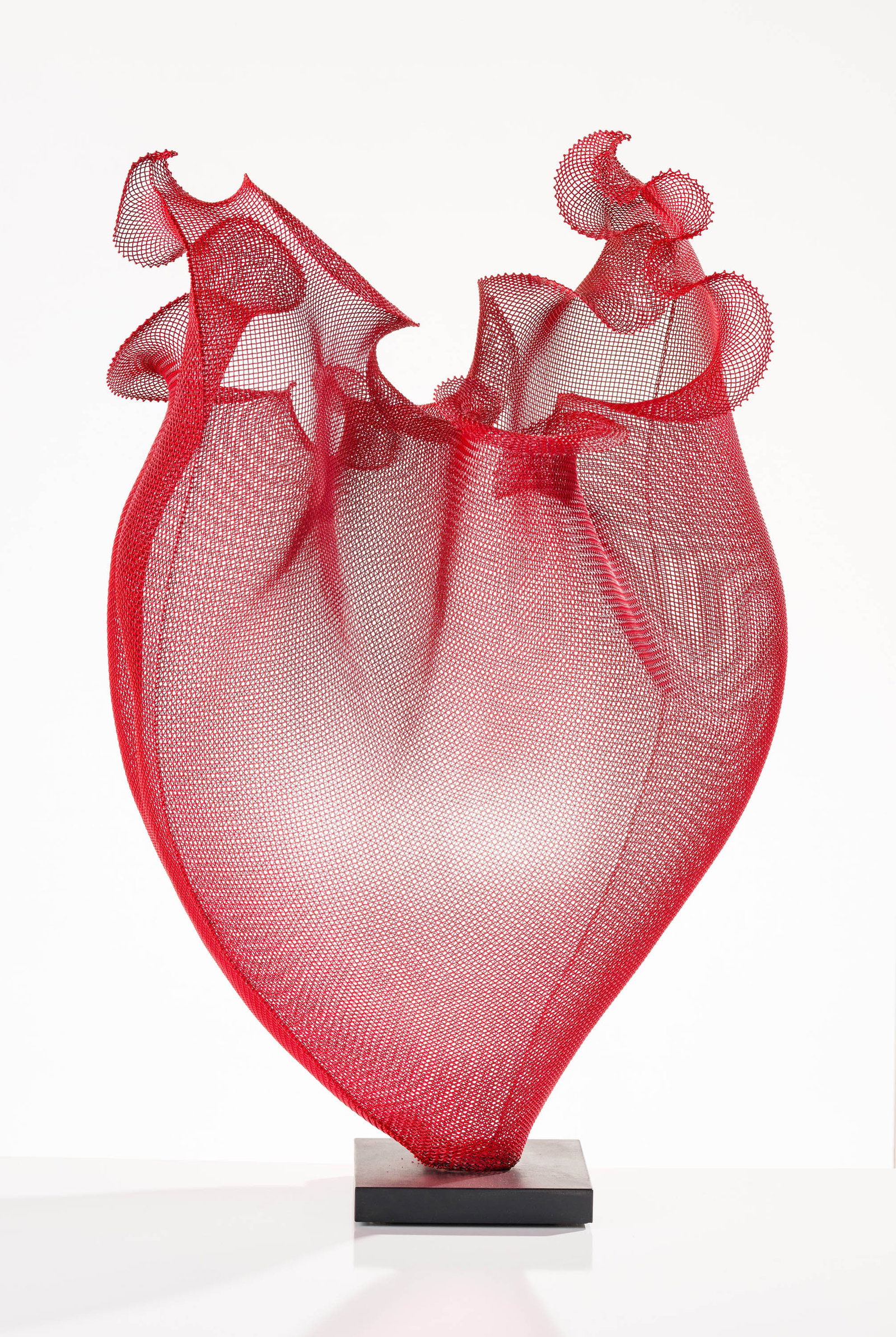 Eric Boyer Red Flower: Eric Boyer (American, 1960-2026) Red Flower Steel wire mesh with powder coating on wood plinth 37 x 24.5 x 19.25 (in) Unsigned Dimensions reflect the entire work. Plinth measures 1.25 (in) tall.