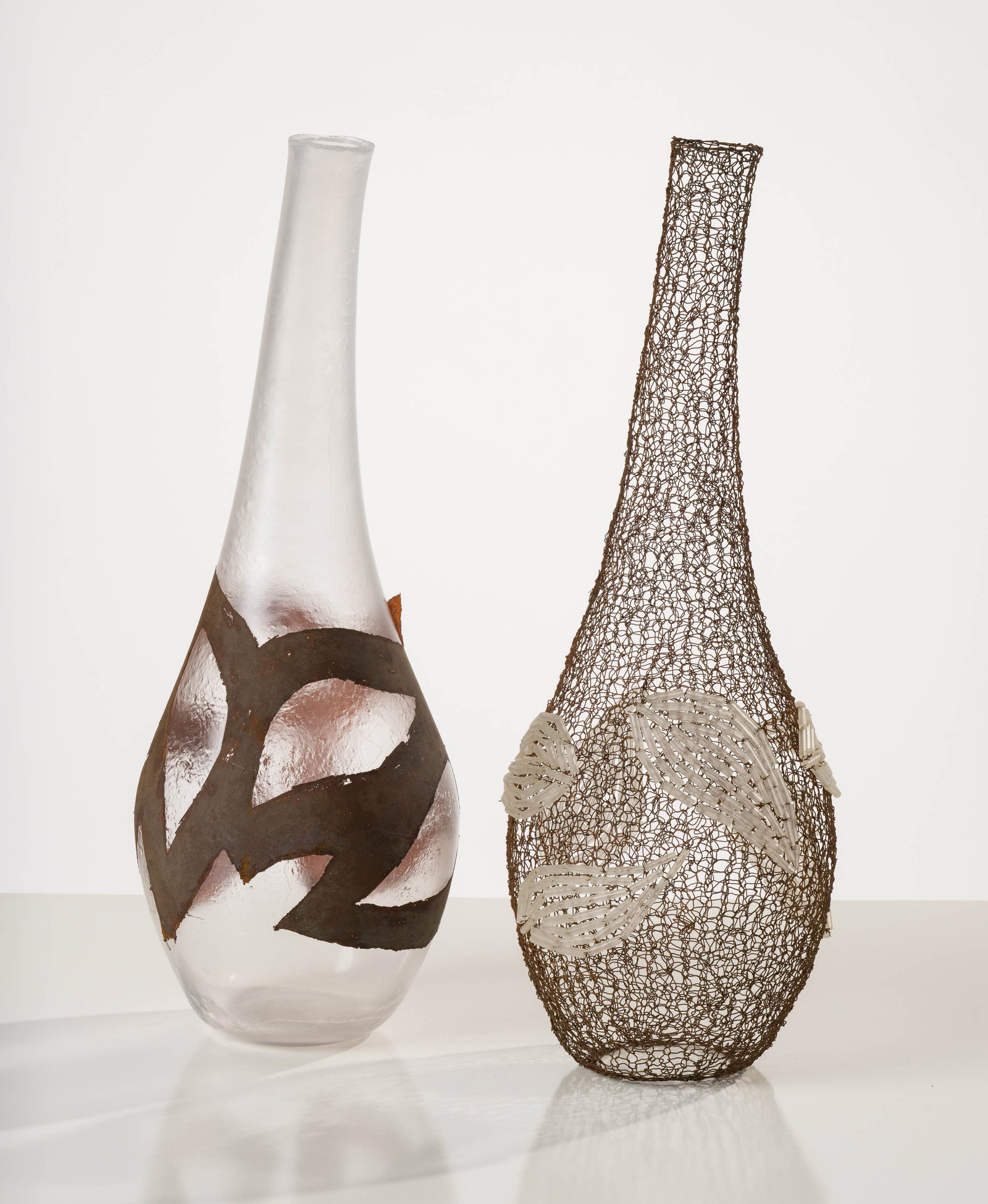 Carole Frève Leaves II, from the Duo series (2 elements), 2005: Carole Frève (Canadian, b. 1967) Leaves II, from the Duo series (2 elements), 2005 (1) Wire with beadwork & (1) Blown glass with electroplated copper 20.5 x 8 x 7 (in) Incised Carole Frève
