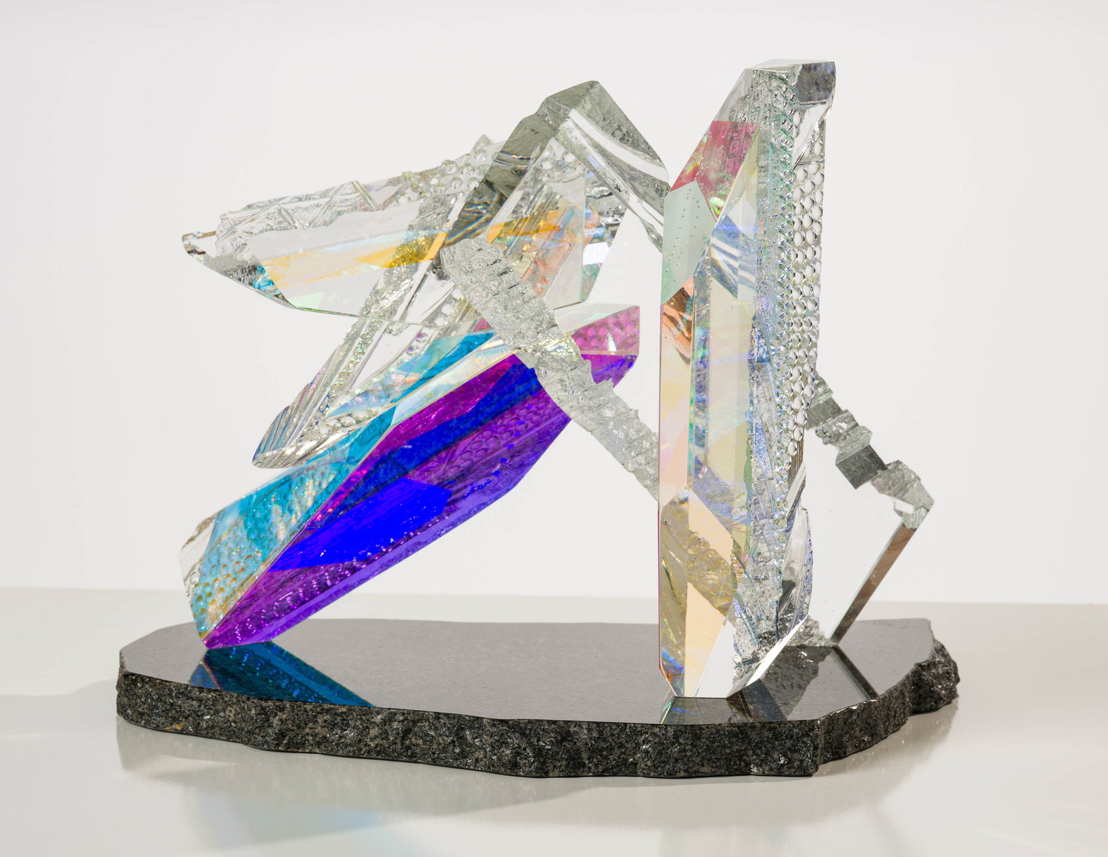 Grant Miller Untitled #41, 1990: Grant Miller (American, 20th Century) Untitled #41, 1990 Cast, cut, and polished crystal with layers of dichroic glass on granite base 11.25 x 14.5 x 8.5 (in) Incised Grant Miller 90 #41, edge of