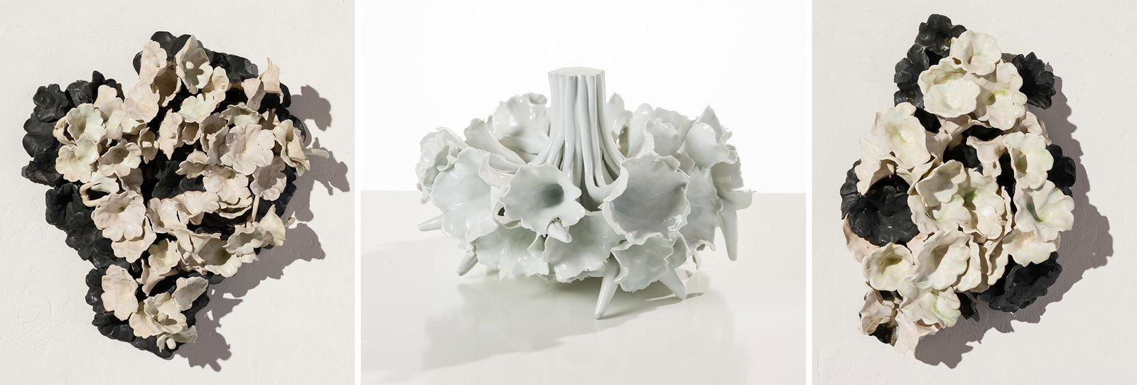 Andrea Marquis (3) Floral Works: Andrea Marquis (American, 20th/21st Century) (3) Floral Works Porcelain with glaze 21.25 x 19.75 x 6.25 (in) Unsigned Dimensions reflect the larger black & white floral arrangement. White bouquet meas