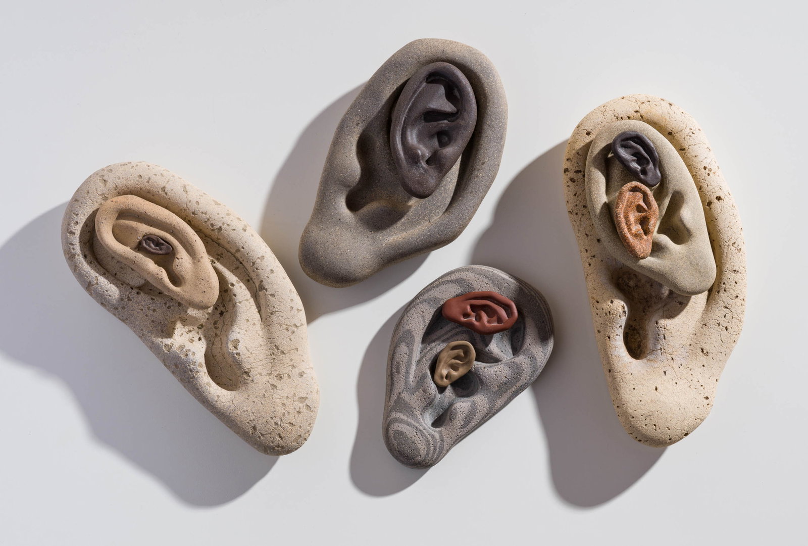 Richard Notkin (4) Sets of Ears, 1999: Richard Notkin (American, b. 1948) (4) Sets of Ears, 1999 Stoneware 11.25 x 5.75 x 2.75 (in) Signed and dated in marker Notkin 1999, bottom of large gray ear Dimensions reflect the largest set of ears