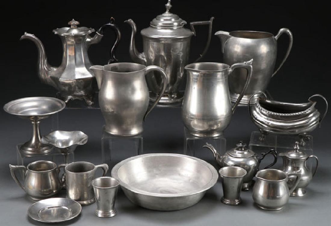 A TWENTY PIECE GROUP OF MOSTLY AMERICAN PEWTER: A TWENTY PIECE GROUP OF MOSTLY AMERICAN PEWTER, 19TH CENTURY. Comprising various sized pitchers, tea pots, mugs, beakers, and plates by assorted makers. The largest 10 inches (25.4 cm). SHIPPING NOTIC
