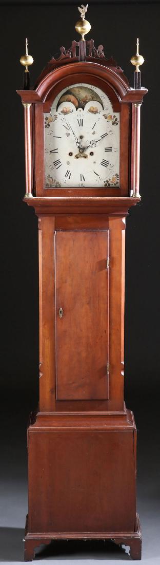 AN AMERICAN FEDERAL PERIOD TALL CASE CLOCK: AN AMERICAN FEDERAL PERIOD TALL CASE CLOCK, EARLY 19TH CENTURY. Attributed to Timothy Chandler Concord, New Hampshire with cherry wood case, scroll cut pediment on arched bonnet and containing a moon