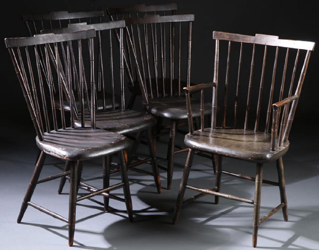 6 EARLY AMERICAN WINDSOR SIDE CHAIRS: A GOOD SET OF SIX EARLY AMERICAN COMB BACK WINDSOR SIDE CHAIRS, CIRCA 1820. With bamboo turned spindles, one with arms. Height 35 inches, width 22 inches, depth 15 inches (89 x 56 x 38 cm). SHIPPING N