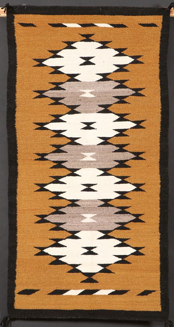 3 SOUTHWEST NAVAJO HANDWOVEN WOOL RUGS: A GROUP OF THREE SOUTHWEST NAVAJO HANDWOVEN WOOL RUGS, 3RD QUARTER OF THE 20TH CENTURY. All with Crownpoint weaver rug labels for Enima Yazzie, White Horse, New Mexico, 50 inches x 31 inches; a Doroth
