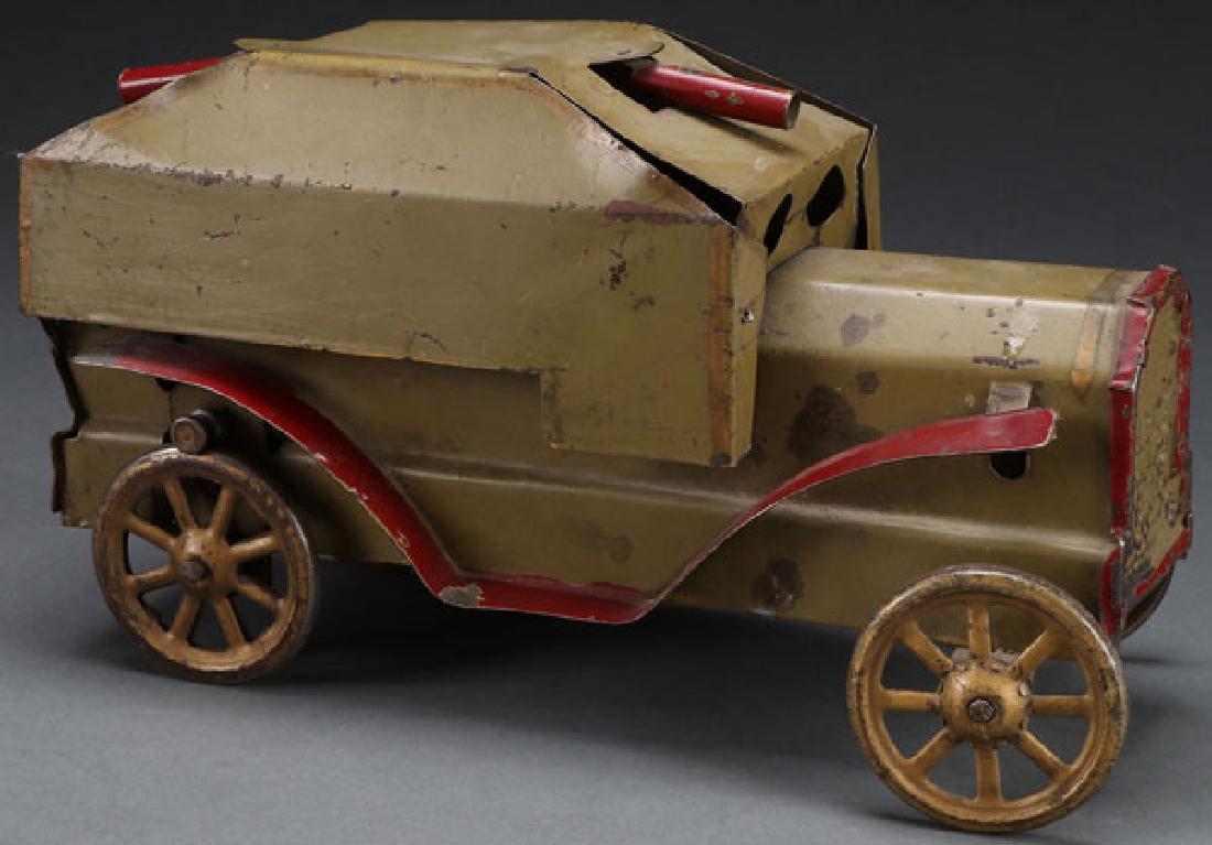 A DAYTON HILLCLIMBER ARMOUR CAR, EARLY 20TH C: A DAYTON HILLCLIMBER ARMOUR CAR, EARLY 20TH CENTURY. Friction powered with patented date 1909. Length 11 inches (28.1 cm). SHIPPING NOTICE: Jackson’s is your sole and only source for one stop packin